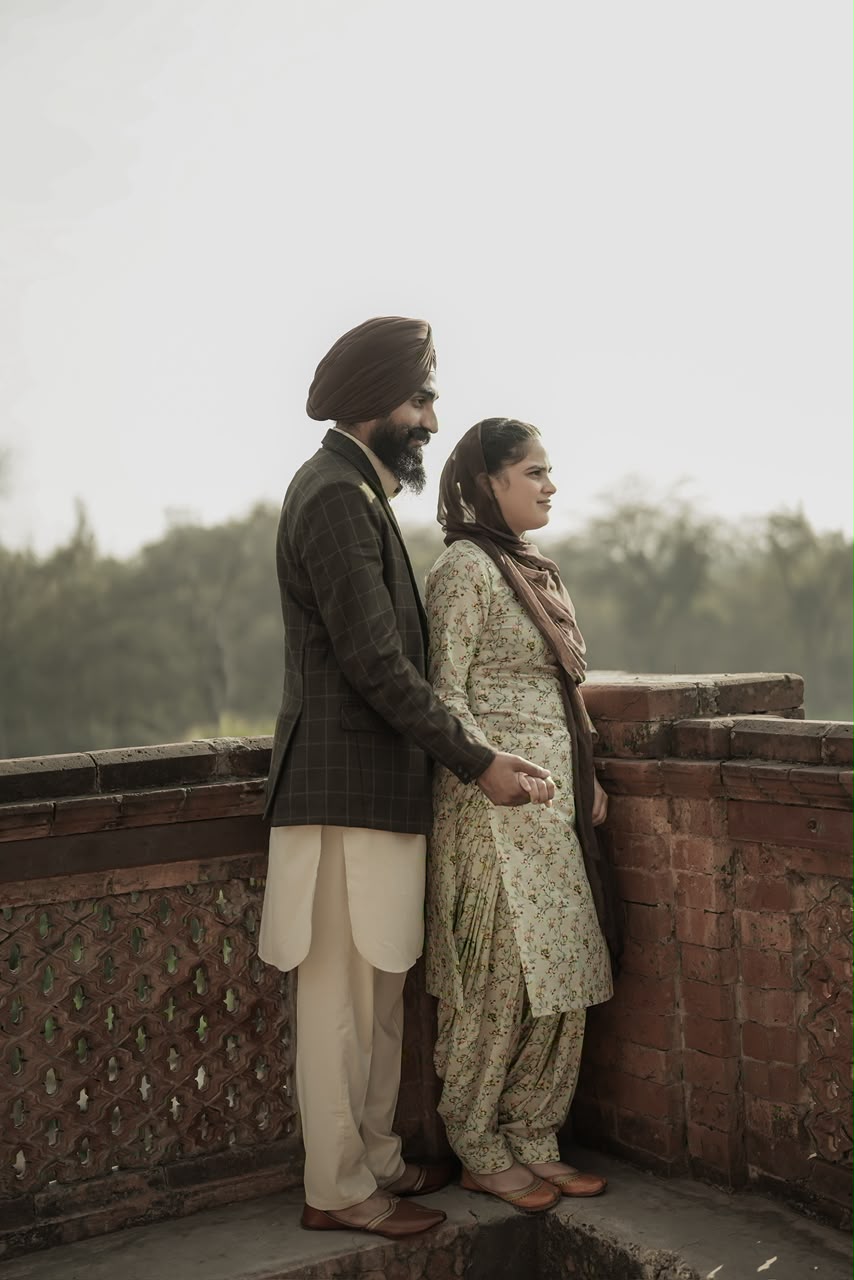 Couple standing together on a heritage balcony