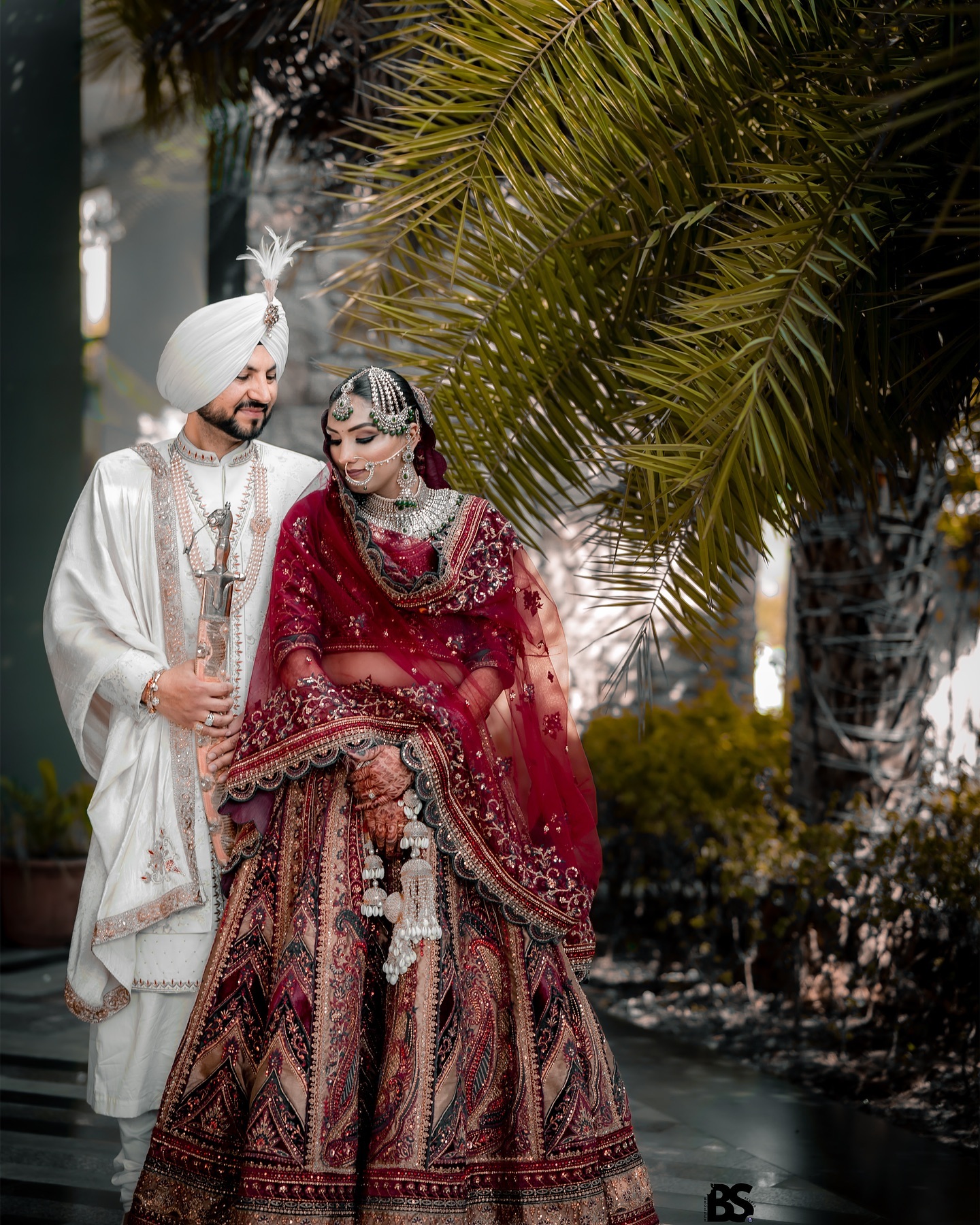 Punjabi wedding couple in a royal outdoor portrait