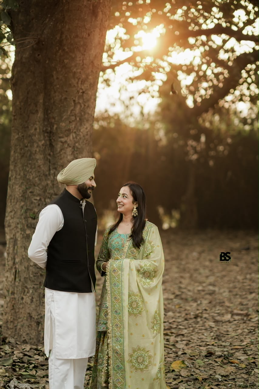 Couple exchanging smiles at sunset